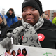 A mother holds a vial with the ashes of her daughter, who died from insulin rationing, during a protest against the high price of insulin outside the offices of drug giant Sanofi in Cambridge, Massachusetts in 2018.